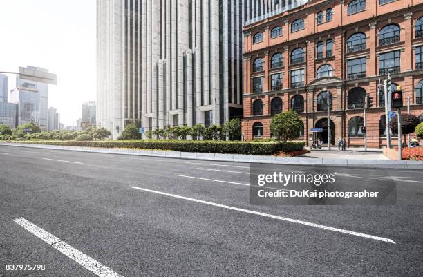 the bund in shanghai - urban road stock pictures, royalty-free photos & images