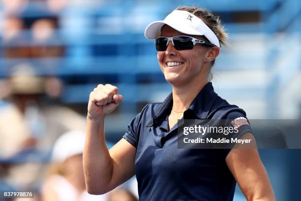 Kirsten Flipkens of Belgium celebrates after defeating Ana Bogdan of Romania during Day 6 of the Connecticut Open at Connecticut Tennis Center at...