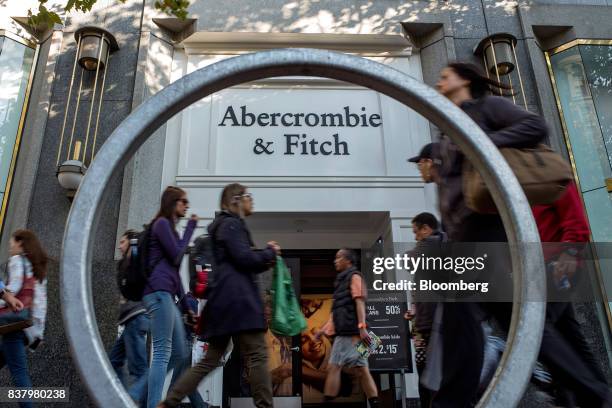 Pedestrians pass in front of an Abercrombie & Fitch Co. Store in San Francisco, California, U.S., on Tuesday, Aug. 22, 2017. Abercrombie & Fitch Co....