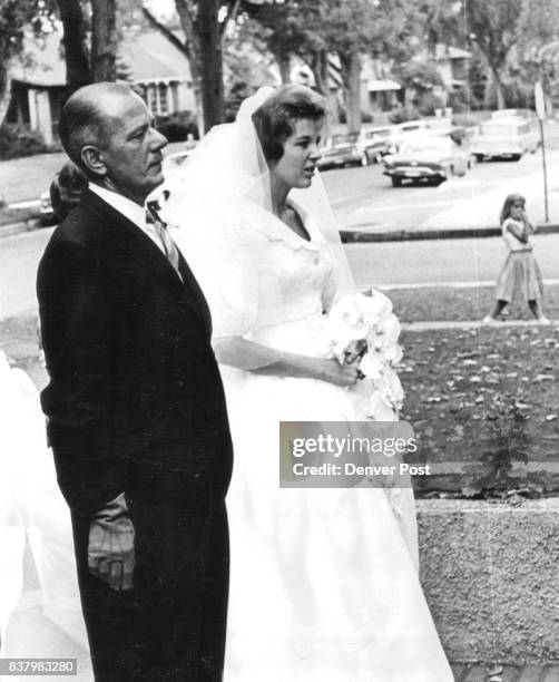 Outside the entrance of St. Thomas Episcopal Church Saturday, Miss Penny Bosworth speaks with her father, Arthur F. Bosworth, before her marriage to...