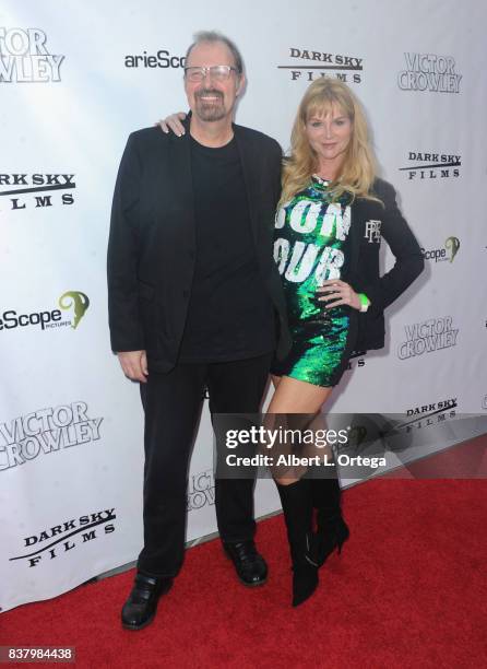 Director Kevin Tenney and Elizabeth Lambert arrive for the "Hatchet" 10th Anniversary Celebration held at ArcLight Cinemas on August 22, 2017 in...