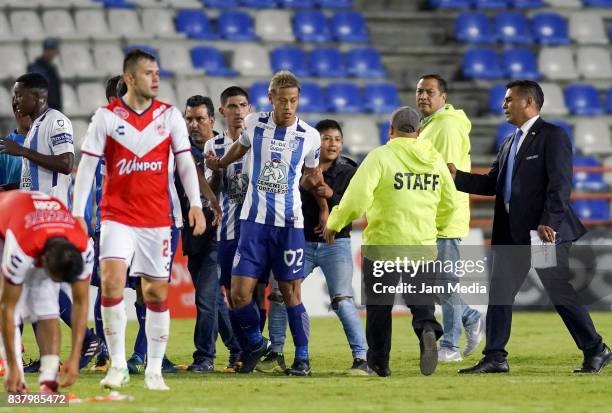 Boy that entered the field hugs Keisuke Honda of Pachuca during the sixth round match between Pachuca and Veracruz as part of the Torneo Apertura...