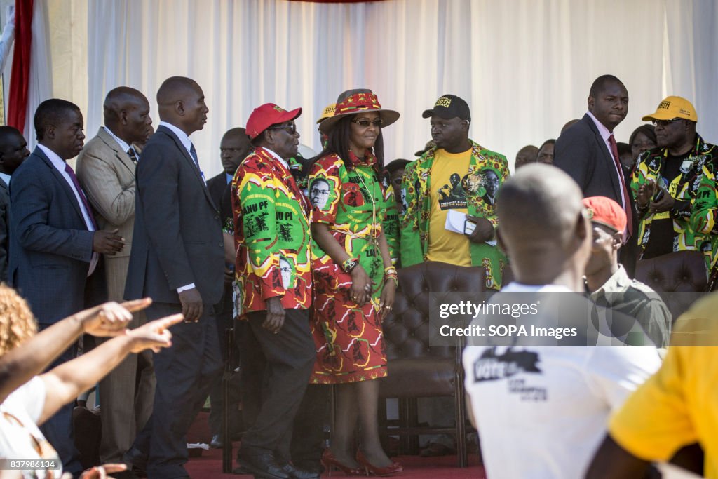Zimbabwe President Robert Mugabe and First Lady Grace Mugabe...