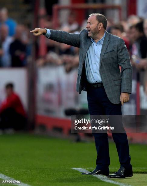 Gary Johnson manager of Cheltenham Town gives instructions to his players during the Carabao Cup Second Round match between Cheltenham Town and West...