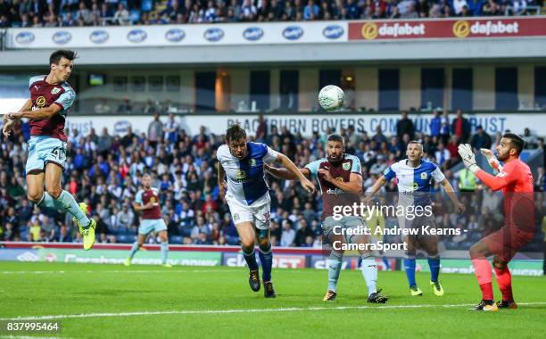 Burnley's Jack Cork scores their first goal with a header during the Carabao Cup Second Round match between Blackburn Rovers and Burnley at Ewood...