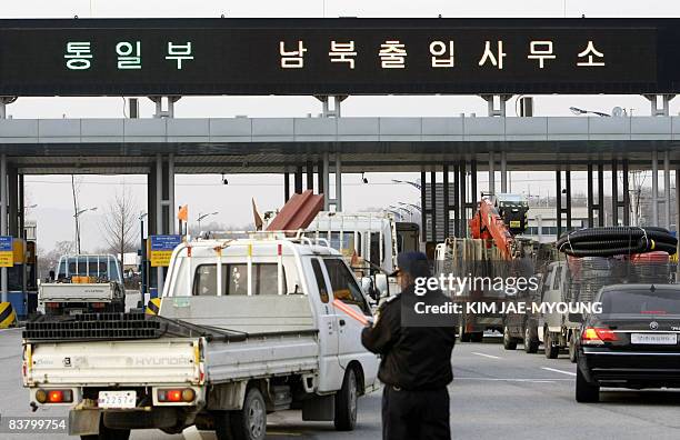 South Korean vehicles head to the North Korean joint industrial estate of Kaesong at a check point of South Korea's customs, immigration and...