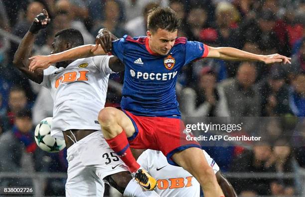 Moscow's midfielder Aleksandr Golovin vies for the ball with Young Boys' midfielder Sekou Sanogo during the UEFA Champions League play off second leg...
