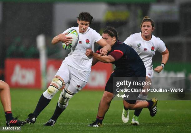 Sarah Hunter of England and Julie Annery of France during the Womens Rugby World Cup semi-final between England and France at the Kingspan Stadium on...