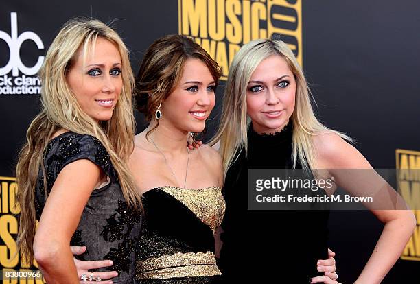 Leticia Cyrus, singer Miley Cyrus, and Brandi Cyrus arrive at the 2008 American Music Awards held at Nokia Theatre L.A. LIVE on November 23, 2008 in...