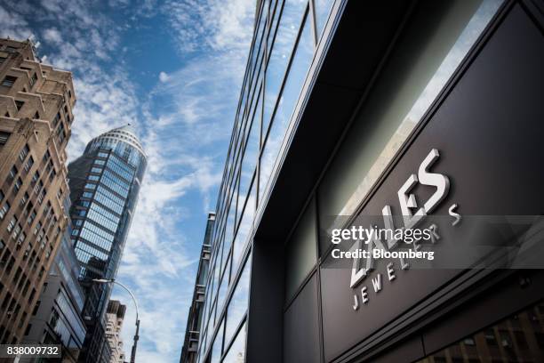Signage for Zales Jewelers, a subsidiary of Signet Jewelers Ltd., is displayed on the exterior of a store in New York, U.S., on Wednesday, Aug. 23,...