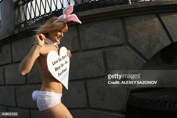 Lisa Franzetta of the organization People for the Ethical Treatment of Animals , wearing only underwear and bunny ears, protests against fur in...
