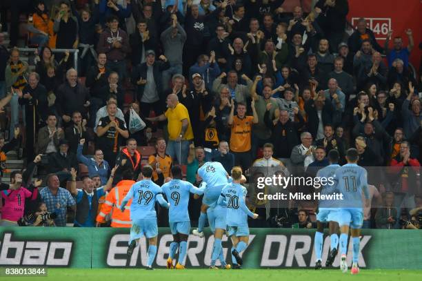 Danny Batth of Wolverhampton Wanderers celebrates scoring his sides first goal with his team mates during the Carabao Cup Second Round match between...