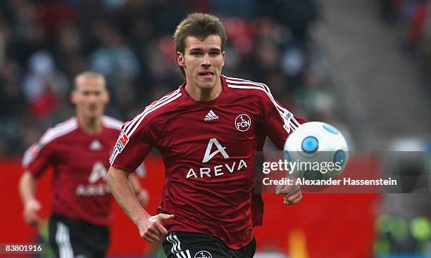 Christian Eigler of Nuernberg runs with the ball during the second Bundesliga match between 1. FC Nuernberg and SpVgg Greuther Fuerth at the...