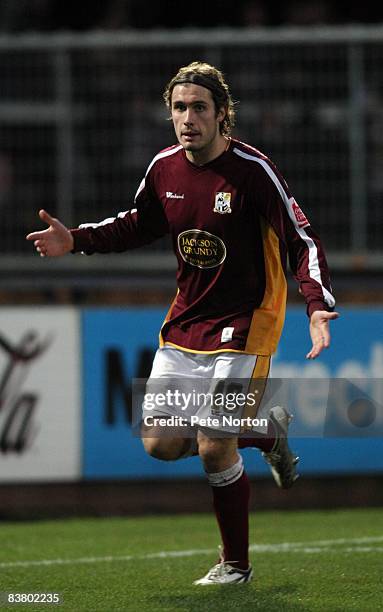 Ryan Gilligan of Northampton Town turns to celebrate after scoring his sides second goal during the Coca Cola League One Match between Hereford...