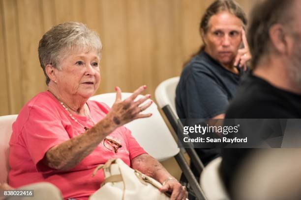 Woman expresses concern to U.S. Rep. Tom Rice about the trustworthiness of special counsel Robert Mueller during a congressional town hall meeting...