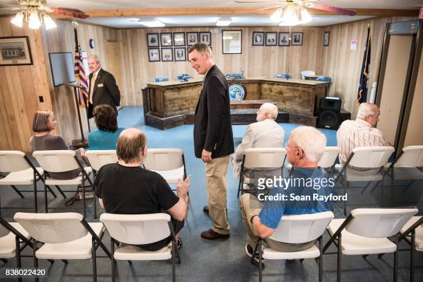 Rep. Tom Rice greets constituents during a congressional town hall meeting August 23, 2017 in Society Hill, South Carolina. Topics of concern for...
