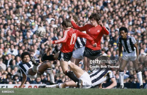 West Bromwich Albion's Romeo Zondervan and John Wile combine to challenge Queens Park Rangers Gary Micklewhite with Simon Stainrod and Brendan Batson...