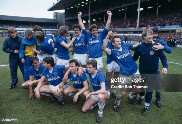 The Everton team celebrate after their 2-0 victory over Queens Park Rangers had clinched the First Division League Championship at Goodison Park, 6th...