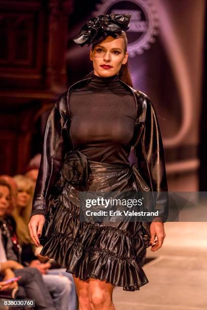 Model walks the runway at the Kjell Nordstrom show during the Fashion Week Oslo on August 23, 2017 in Oslo, Norway.