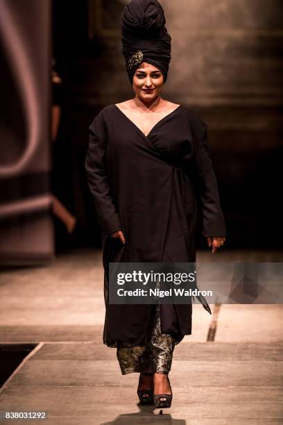 Model walks the runway at the Kjell Nordstrom - Black Rose by BvB show during the Fashion Week Oslo Spring/Summer 2018 at the Kulturkirken Jakob on...