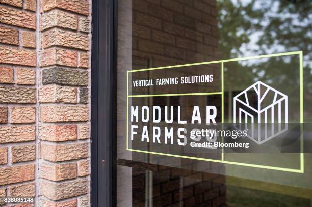 Signage is seen on the door of Modular Farms Co. Headquarters in Brampton, Ontario, Canada, on Friday, Aug. 11, 2017. The popularity of modular farms...