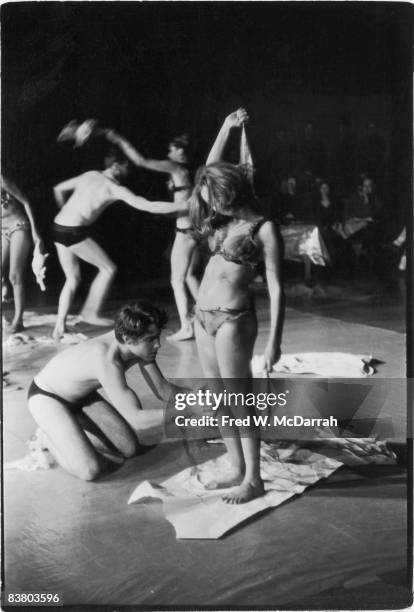 View of actors on stage as they perform Carolee Schneemann's performance art piece 'Meat Joy' in the Judson Memorial Church auditorium, New York, New...