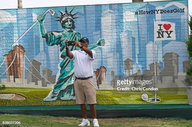 Fan takes a selfie at the selfie wall during practice for THE NORTHERN TRUST at Glen Oaks Club on August 23 in Old Westbury, New York.