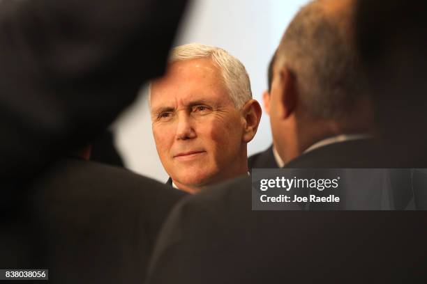 Vice President Mike Pence greets people after speaking about the ongoing crisis in Venezuela at Our Lady of Guadalupe Catholic Church on August 23,...