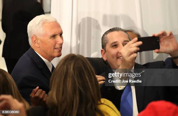 Vice President Mike Pence greets people after speaking about the ongoing crisis in Venezuela at Our Lady of Guadalupe Catholic Church on August 23,...