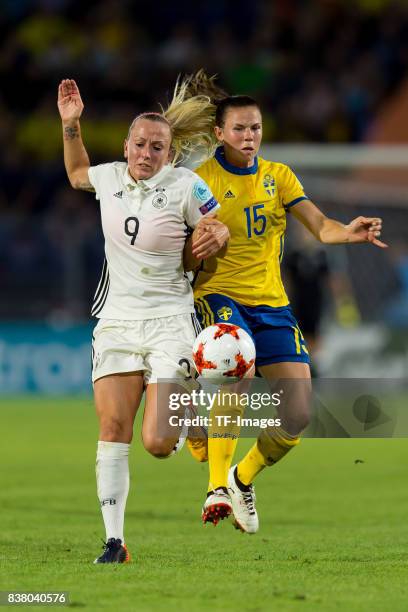 Mandy Islacker of Germany and Jessica Samuelsson of Sweden battle for the ball l during the Group B match between Germany and Sweden during the UEFA...