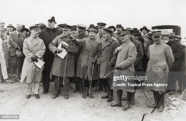 French military commander Maxime Weygand , points describes one of the battles of World War I to King George V of Great Britain, during a royal visit...