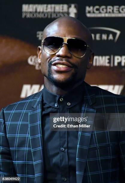 Boxer Floyd Mayweather Jr. Arrives at a news conference at the KA Theatre at MGM Grand Hotel & Casino on August 23, 2017 in Las Vegas, Nevada....