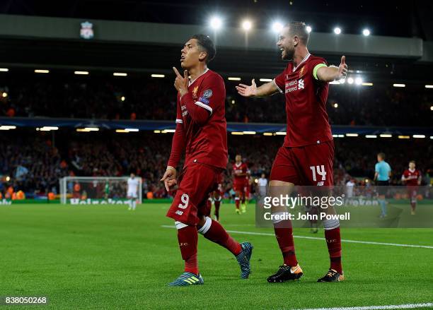 Roberto Firmino of Liverpool celebrates the after scoring the forth goal during the UEFA Champions League Qualifying Play-Offs round second leg match...