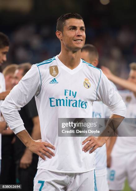 Cristiano Ronaldo of Real Madrid CF smiles after his team won the Santiago Bernabeu Trophy match 2-1 between Real Madrid CF and ACF Fiorentina at...