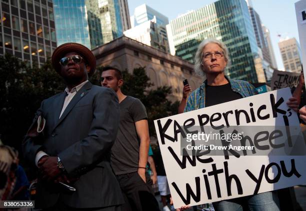 Activists rally in support of NFL quarterback Colin Kaepernick outside the offices of the National Football League on Park Avenue, August 23, 2017 in...