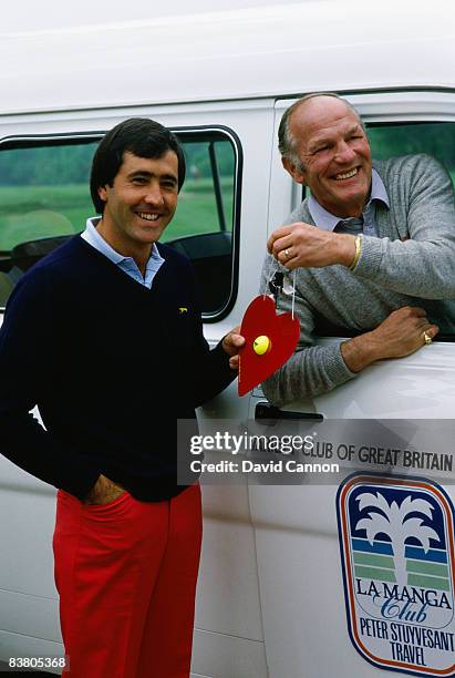 Spanish golfer Seve Ballesteros with British former boxer Henry Cooper, La Manga, Spain, 1988. Cooper is driving a Variety Club Of Great Britain van.