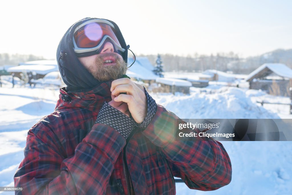 Man preparing for winter ride