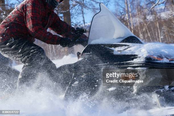 unforgettable experience of snowmobiling - cliqueimages stock pictures, royalty-free photos & images