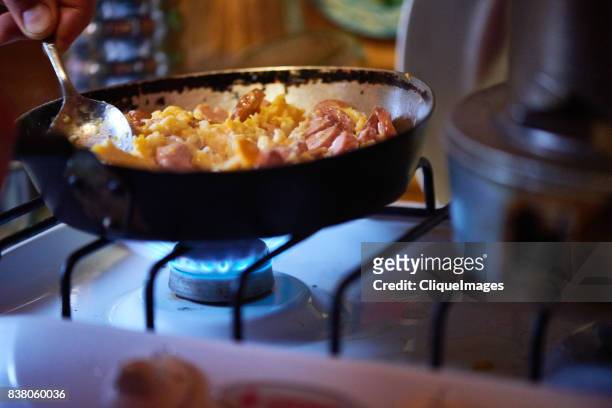 appetizing omelette with sausage - cliqueimages stock-fotos und bilder