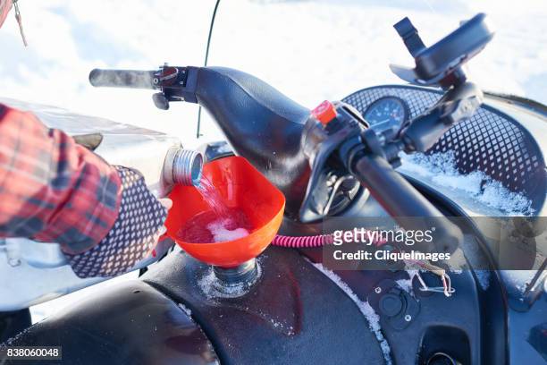 fuel for snowmobile - cliqueimages stock pictures, royalty-free photos & images