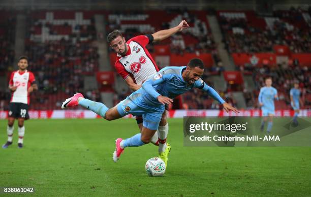 Jordan Graham of Wolverhampton Wanderers is fouled by Sam McQueen of Southampton during the Carabao Cup Second Round match between Southampton and...