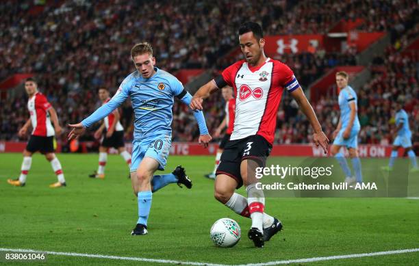 Connor Ronan of Wolverhampton Wanderers and Maya Yoshida of Southampton during the Carabao Cup Second Round match between Southampton and...