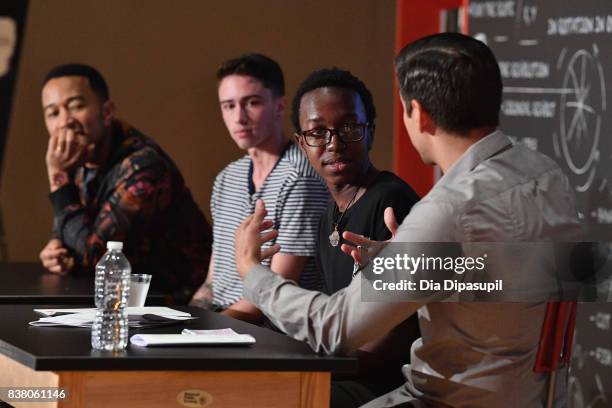 John Legend, Hunter Klugkist, Solomon Mussing, Carlos Andrés Gómez speak onstage at the announcement of the AXE Senior Orientation program on August...