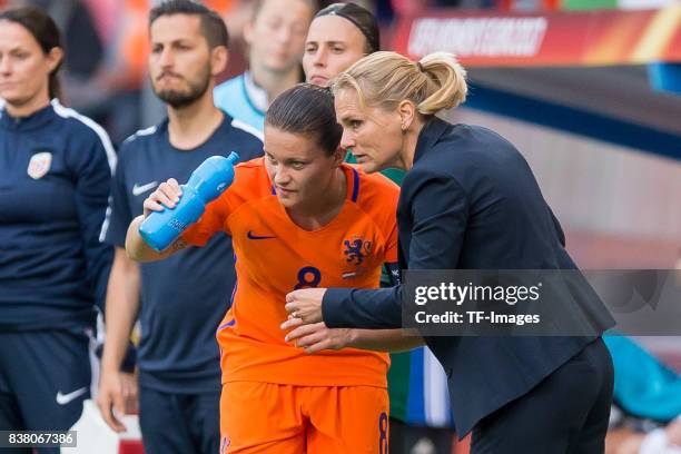 Sherida Spitse of the Netherlands speak with Head coach Sarina Wiegman of the Netherlands during their Group A match between Netherlands and Norway...