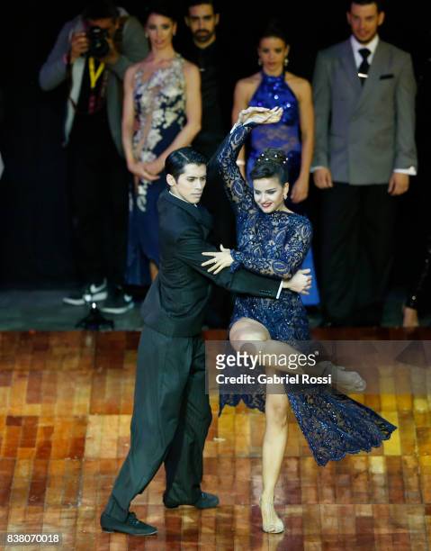 Agostina Tarchini and Axel Arakaki of Argentine dance after winning the final round of the Tango Stage competition as part of the Buenos Aires...
