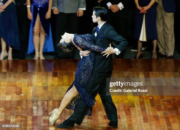 Agostina Tarchini and Axel Arakaki of Argentine dance after winning the final round of the Tango Stage competition as part of the Buenos Aires...