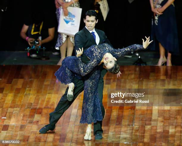 Agostina Tarchini and Axel Arakaki of Argentine dance after winning the final round of the Tango Stage competition as part of the Buenos Aires...