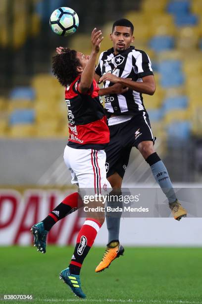 Willian Aro of Flamengo struggles for the ball with Matheus Fernandes of Botafogo during a match between Flamengo and Botafogo part of Copa do Brasil...