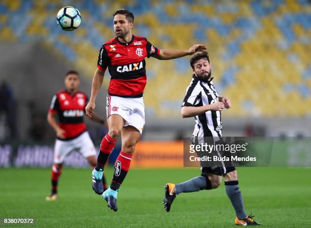 Diego of Flamengo struggles for the ball with Joao Paulo of Botafogo during a match between Flamengo and Botafogo part of Copa do Brasil Semi-Finals...
