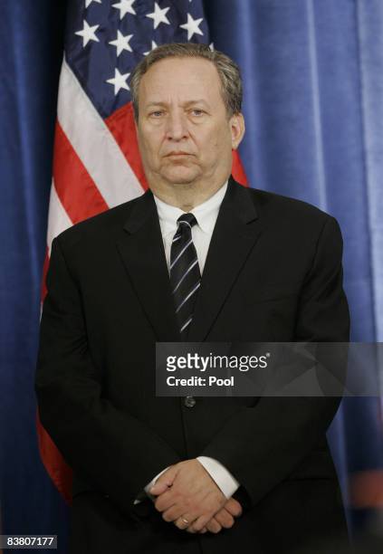 National Economic Council Director-designate Lawrence Summers stands at a news conference where President-elect Barack Obama introduced his economic...